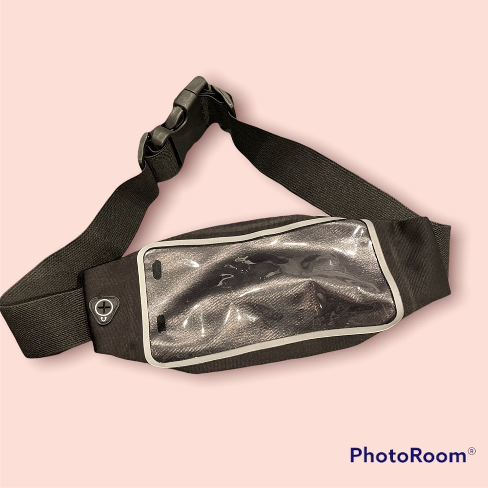 Phone waist carrier with headphones opening